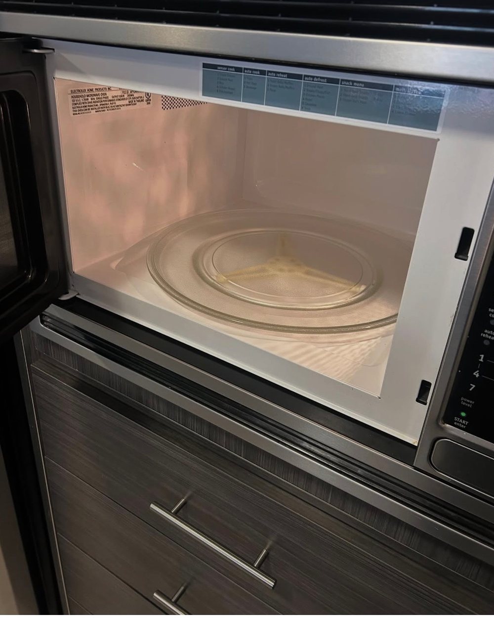 A microwave interior cleaned to like new